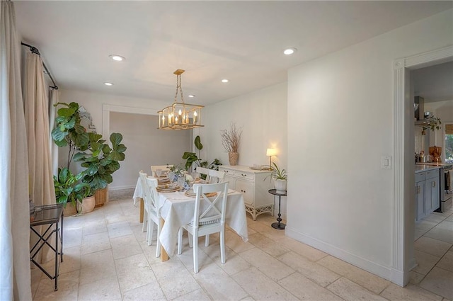 10236 Noland Rd, Lenexa, KS 66215 - dining room featuring a chandelier, recessed lighting, and baseboards