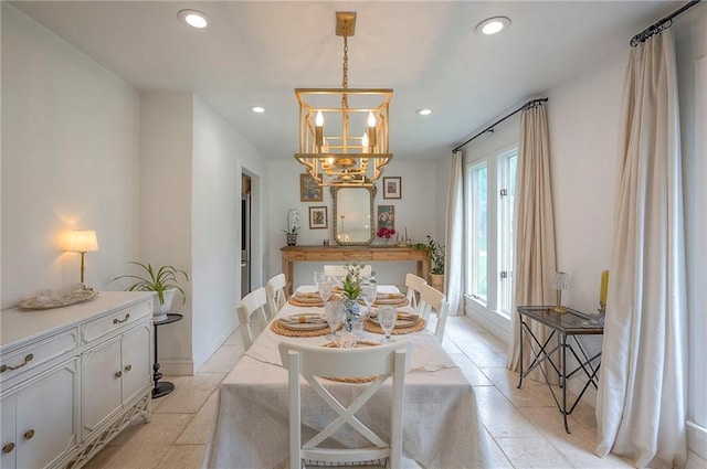 10236 Noland Rd, Lenexa, KS 66215 - dining area with a chandelier and recessed lighting