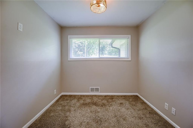 5112 Rock Creek Ln, Mission, KS 66205 - carpeted empty room with baseboards