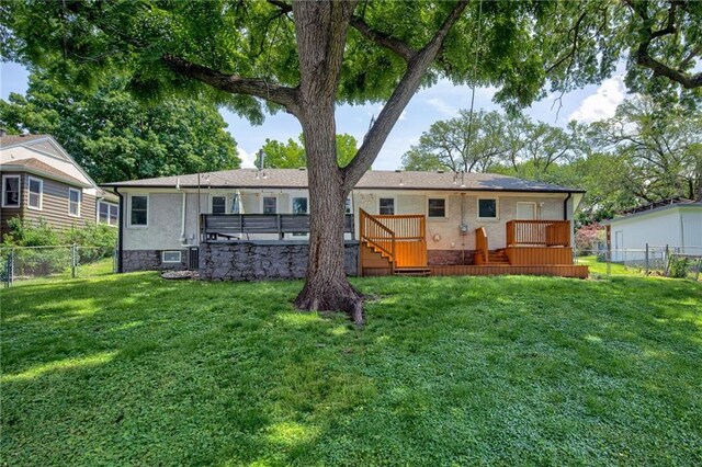 5112 Rock Creek Ln, Mission, KS 66205 - back of property with a deck and a hot tub