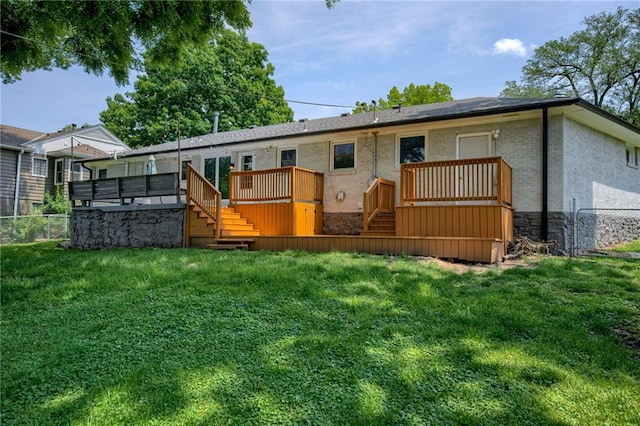 5112 Rock Creek Ln, Mission, KS 66205 - back of property featuring stairway, brick siding, a wooden deck, and stone siding
