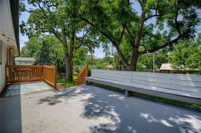 5112 Rock Creek Ln, Mission, KS 66205 - view of patio featuring view of wooded area