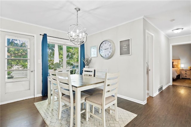 5112 Rock Creek Ln, Mission, KS 66205 - dining area with a chandelier, dark wood-style flooring, ornamental molding, and baseboards