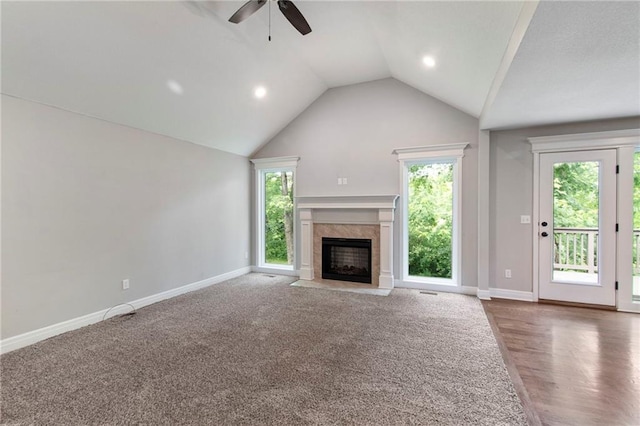 9 Platte Ridge Ct, Edgerton, MO 64444 - unfurnished living room with a ceiling fan, lofted ceiling, baseboards, a fireplace, and recessed lighting