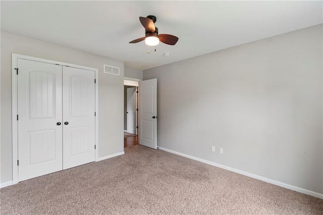 9 Platte Ridge Ct, Edgerton, MO 64444 - unfurnished bedroom featuring carpet flooring, a closet, baseboards, and ceiling fan
