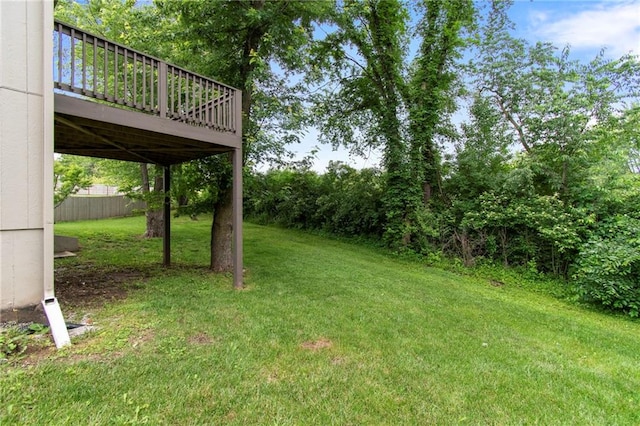 9 Platte Ridge Ct, Edgerton, MO 64444 - view of green lawn with a wooden deck