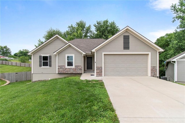 9 Platte Ridge Ct, Edgerton, MO 64444 - single story home featuring a garage, driveway, and stone siding