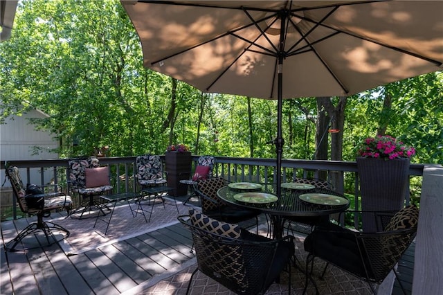 12577 S Alcan Cir, Olathe, KS 66062 - wooden deck with outdoor dining area