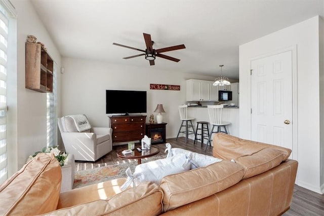 3486 SW Wysteria Ter, Lees Summit, MO 64082 - living area featuring wood finished floors and a ceiling fan