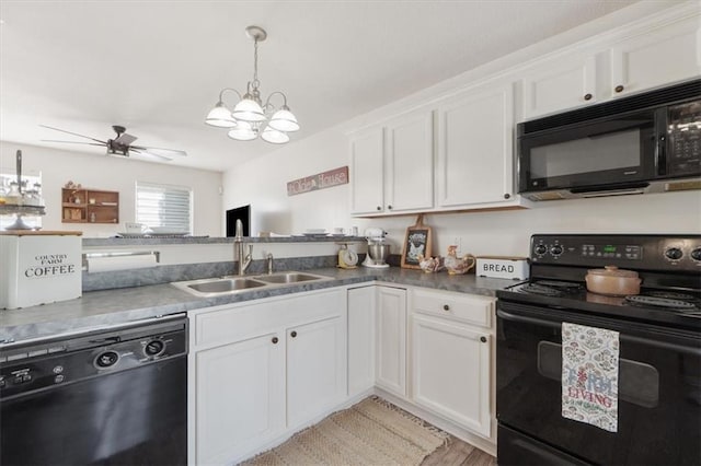 3486 SW Wysteria Ter, Lees Summit, MO 64082 - kitchen with black appliances, white cabinetry, a ceiling fan, and decorative light fixtures