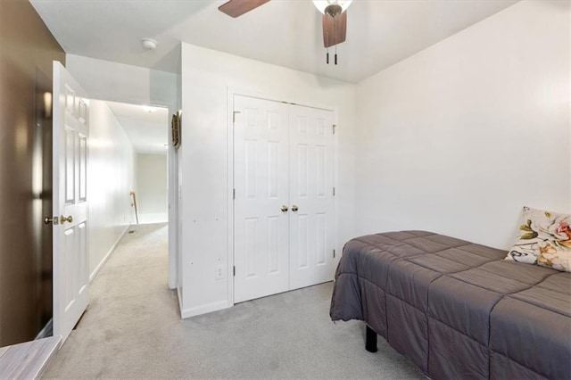 3486 SW Wysteria Ter, Lees Summit, MO 64082 - carpeted bedroom with a closet and a ceiling fan