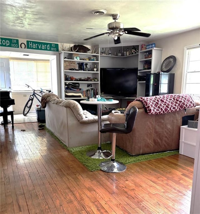 1024 Iowa St, Lawrence, KS 66044 - living room with hardwood / wood-style floors and ceiling fan