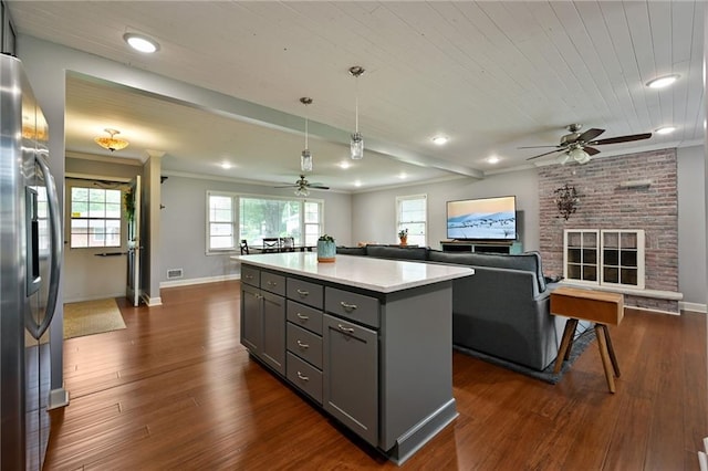 701 N Apache Dr, Independence, MO 64056 - kitchen featuring ceiling fan, gray cabinetry, stainless steel fridge, open floor plan, and recessed lighting
