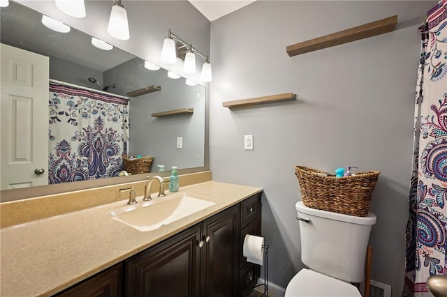 701 N Apache Dr, Independence, MO 64056 - full bath with vanity, toilet, and a shower with curtain