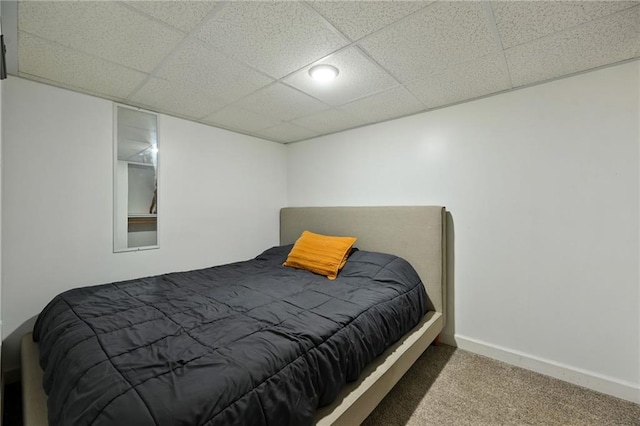 701 N Apache Dr, Independence, MO 64056 - bedroom with carpet flooring, a paneled ceiling, and baseboards