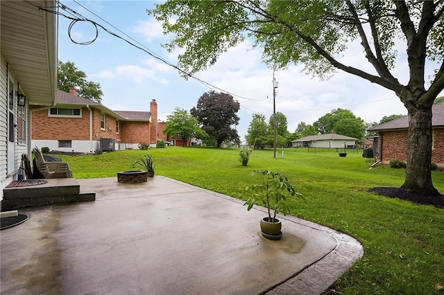 701 N Apache Dr, Independence, MO 64056 - view of patio with a fire pit and cooling unit
