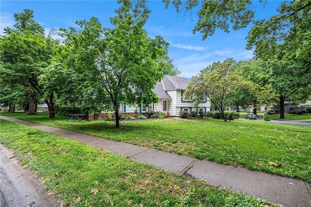 9601 W 97th St, Overland Park, KS 66212 - view of front of home with a front yard