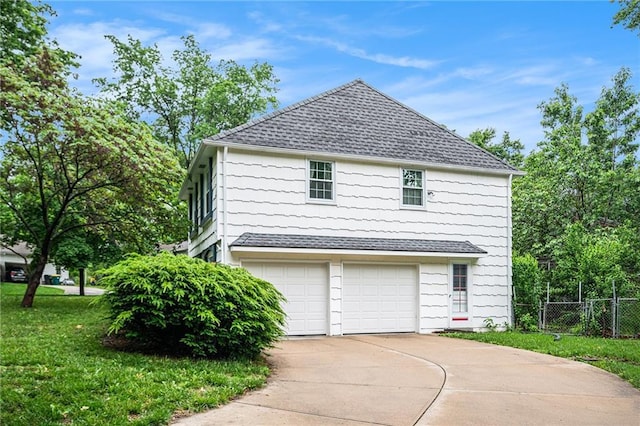 9601 W 97th St, Overland Park, KS 66212 - view of side of property featuring a shingled roof, driveway, and a garage