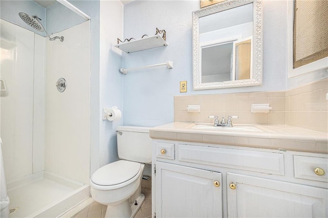 9601 W 97th St, Overland Park, KS 66212 - bathroom with toilet, a shower stall, vanity, and tile patterned flooring