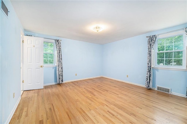 9601 W 97th St, Overland Park, KS 66212 - spare room with light wood-style floors and baseboards