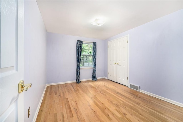 9601 W 97th St, Overland Park, KS 66212 - spare room with light wood-style flooring and baseboards