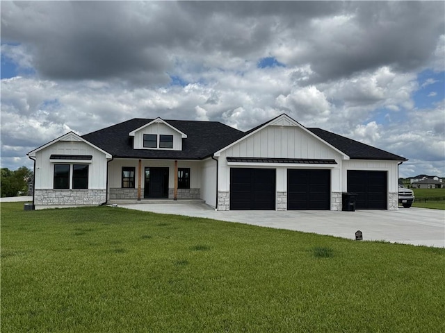 6601 Lakeside Cir, Odessa, MO 64076 - modern farmhouse style home with board and batten siding, stone siding, a garage, and a porch
