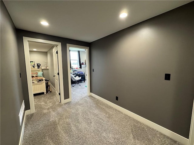 6601 Lakeside Cir, Odessa, MO 64076 - hallway featuring recessed lighting, carpet floors, and baseboards