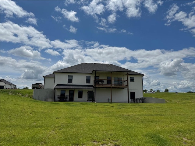 6601 Lakeside Cir, Odessa, MO 64076 - back of house featuring a lawn