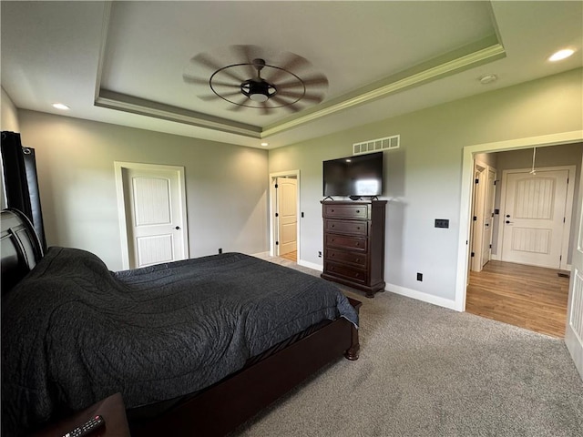 6601 Lakeside Cir, Odessa, MO 64076 - bedroom with a tray ceiling, carpet floors, recessed lighting, baseboards, and a ceiling fan