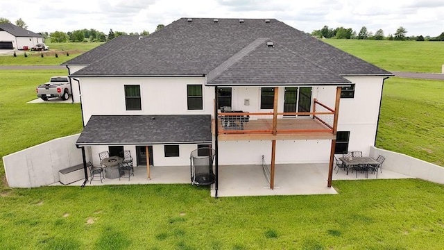 6601 Lakeside Cir, Odessa, MO 64076 - rear view of house featuring a patio, roof with shingles, and a yard