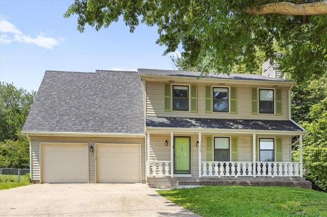 1305 N Hunter Dr, Olathe, KS 66061 - view of front of house featuring a garage, a porch, concrete driveway, a chimney, and a front yard
