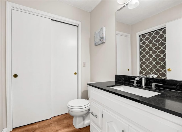1305 N Hunter Dr, Olathe, KS 66061 - bathroom featuring vanity and wood finished floors