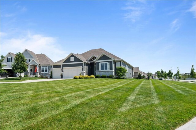 13389 W 147th Ter, Olathe, KS 66062 - view of front of property with a garage, a front lawn, and driveway