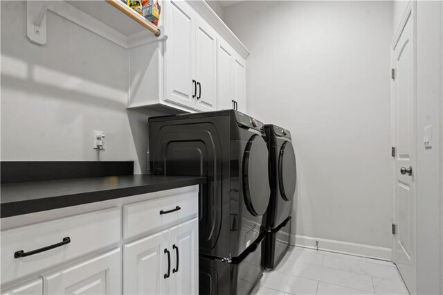 13389 W 147th Ter, Olathe, KS 66062 - laundry area featuring washer and dryer and cabinet space
