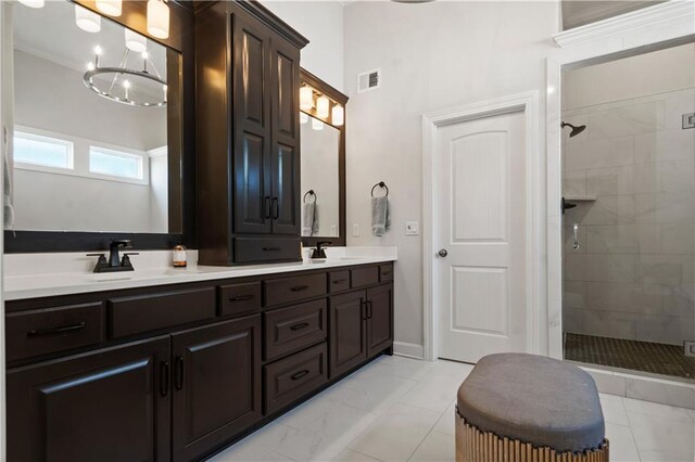 13389 W 147th Ter, Olathe, KS 66062 - full bathroom featuring a shower stall, marble finish floors, double vanity, and a high ceiling
