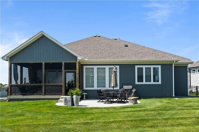 13389 W 147th Ter, Olathe, KS 66062 - back of property with a patio, a sunroom, and roof with shingles