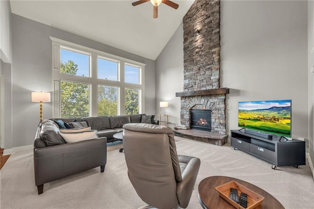 2301 NE 110th St, Kansas City, MO 64155 - living room featuring high vaulted ceiling, a ceiling fan, a fireplace, and carpet