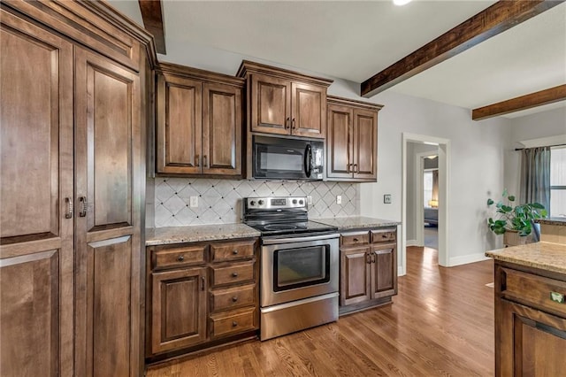 2301 NE 110th St, Kansas City, MO 64155 - kitchen with black microwave, stainless steel electric stove, backsplash, beam ceiling, and dark wood-style flooring