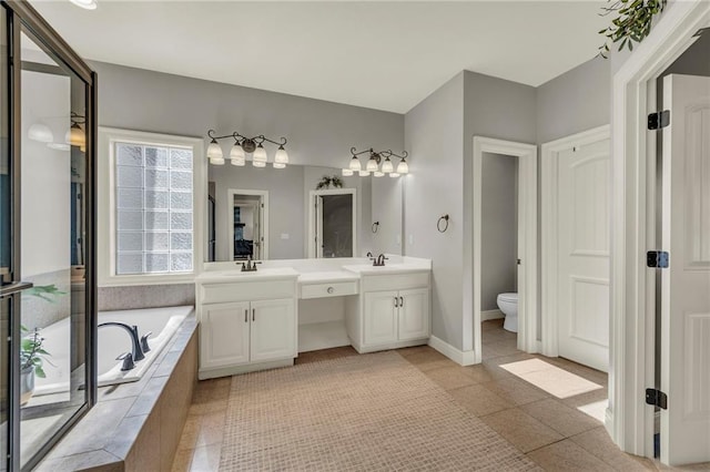 2301 NE 110th St, Kansas City, MO 64155 - full bathroom with double vanity and a garden tub