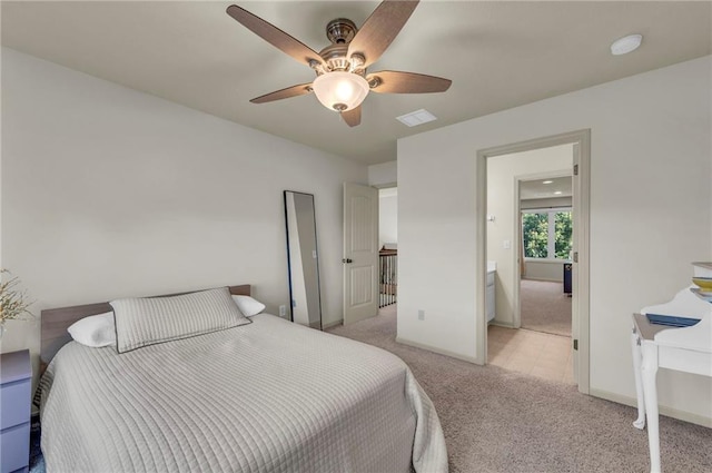 2301 NE 110th St, Kansas City, MO 64155 - bedroom with light colored carpet and ceiling fan