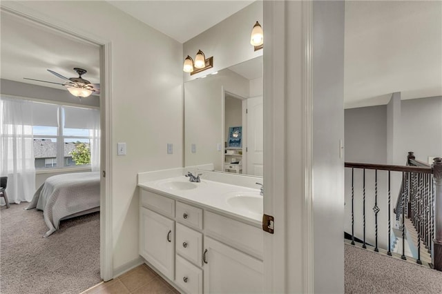 2301 NE 110th St, Kansas City, MO 64155 - bathroom with double vanity, ensuite bathroom, and ceiling fan