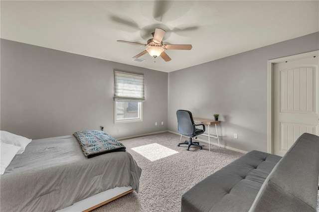 2301 NE 110th St, Kansas City, MO 64155 - carpeted bedroom featuring baseboards and ceiling fan