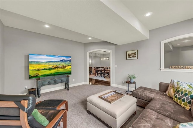 2301 NE 110th St, Kansas City, MO 64155 - carpeted living area featuring arched walkways and recessed lighting