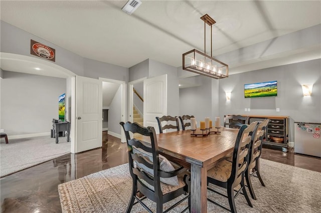 2301 NE 110th St, Kansas City, MO 64155 - dining room with baseboards and stairway