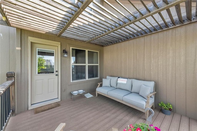 2301 NE 110th St, Kansas City, MO 64155 - wooden deck featuring an outdoor living space and a pergola