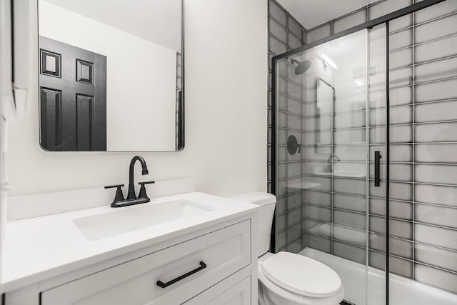 9599 Outlook Dr, Overland Park, KS 66207 - full bathroom with toilet, a shower stall, and vanity
