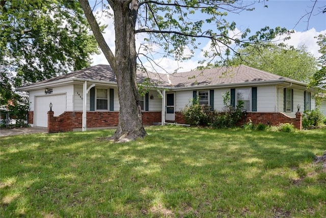 14400 E 32nd Ter S, Independence, MO 64055 - ranch-style house featuring brick siding, an attached garage, and a front lawn