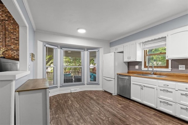 12509 W 100th Ter, Lenexa, KS 66215 - kitchen featuring stainless steel dishwasher, freestanding refrigerator, crown molding, white cabinets, and dark wood-style floors
