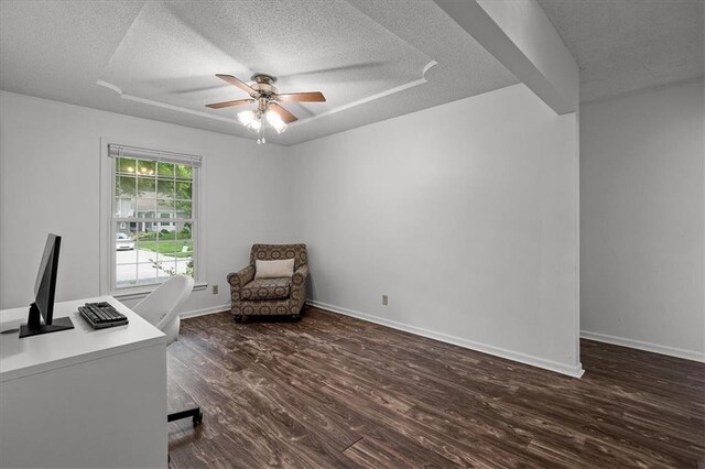 12509 W 100th Ter, Lenexa, KS 66215 - unfurnished office with a textured ceiling, a ceiling fan, and dark wood-type flooring