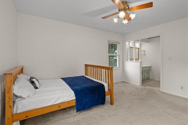 12509 W 100th Ter, Lenexa, KS 66215 - carpeted bedroom with baseboards and ceiling fan